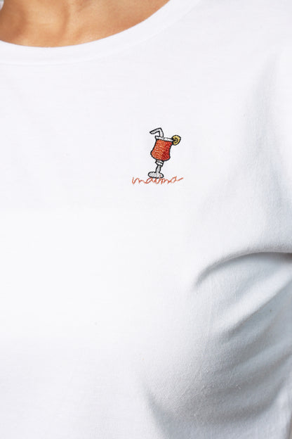 White t-shirt with a small embroidered design of a cocktail.